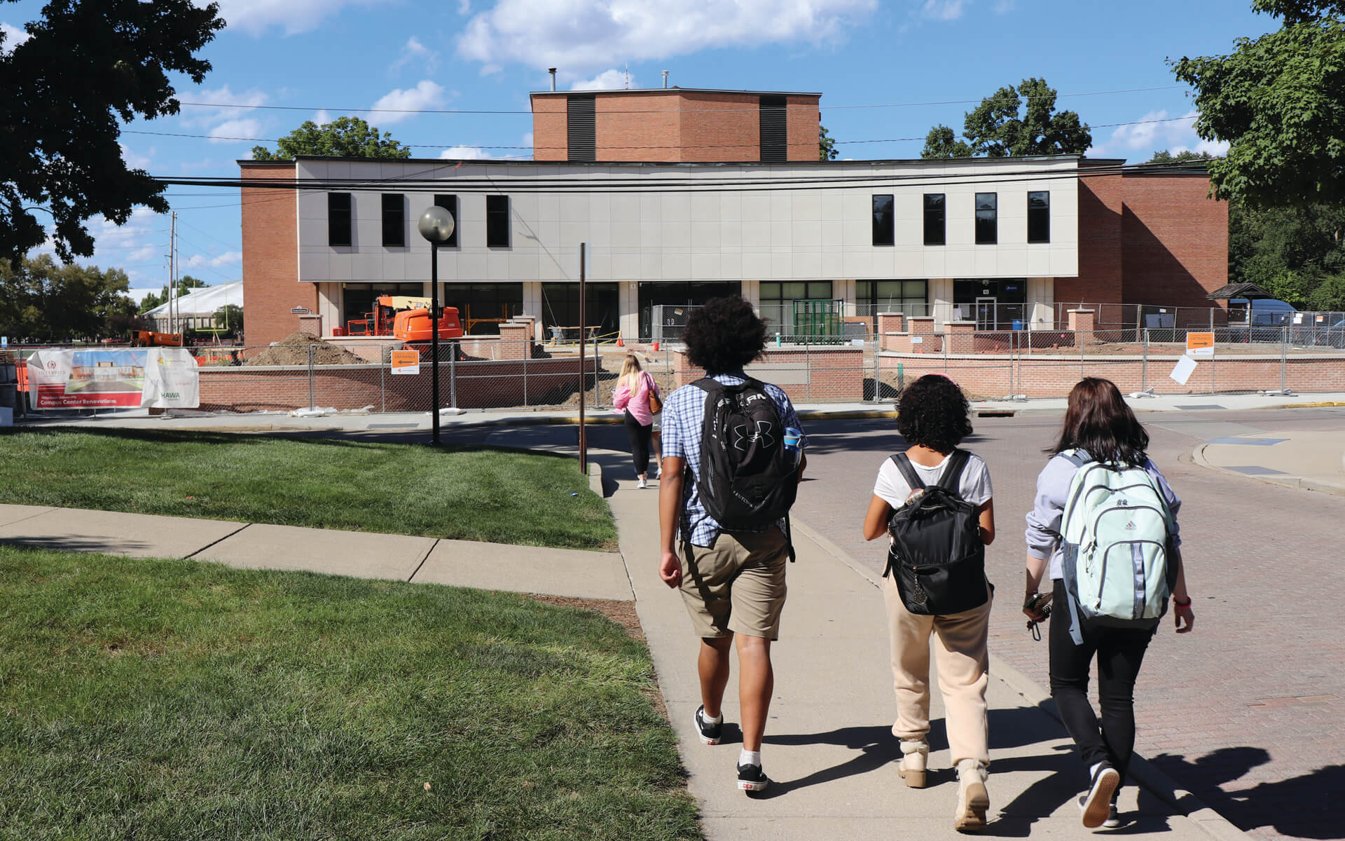 Student Walking Towards Campus Center