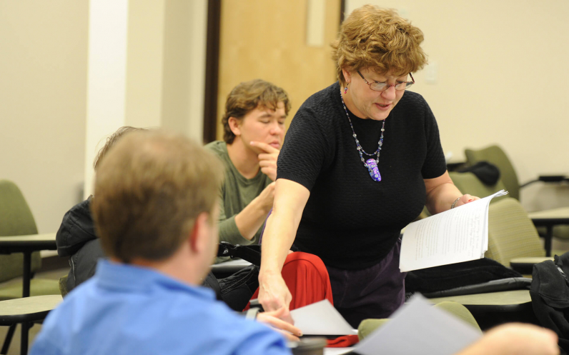 An otterbein faculty member leads students through a classroom activity.