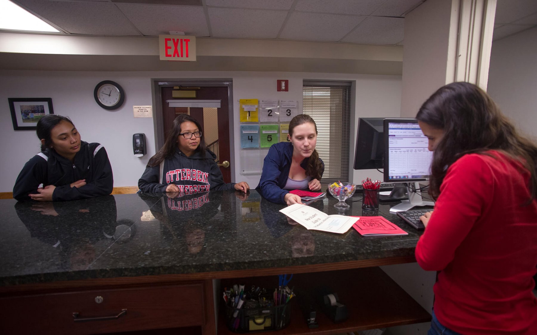 Otterbein students at the Registrar's service counter.