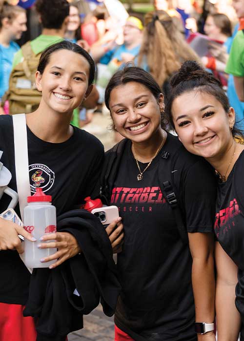 Threestudentssmiling Outside