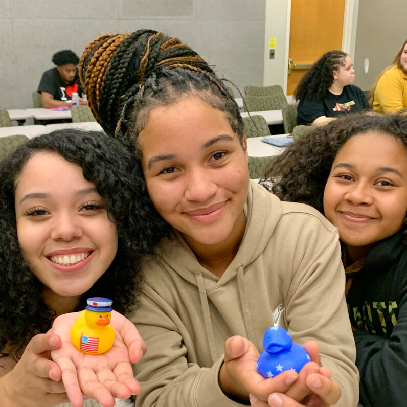 Students attend a non-partisan debate watch party on Sept. 10, 2024.