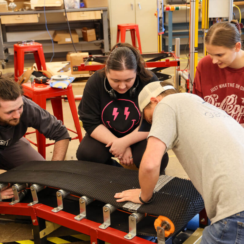 Students Working In Engineering Lab Project