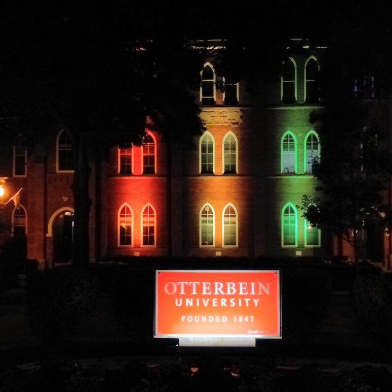 Otterbein Towers Hall lit with Rainbow light, Pride celebration